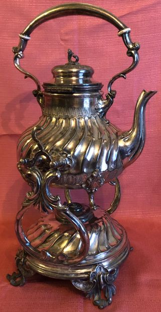 null Tea fountain and its stove in silver plated metal decorated with wavelets and...