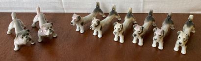 null Eight porcelain knife holders, six featuring a Fox terrier and two featuring...