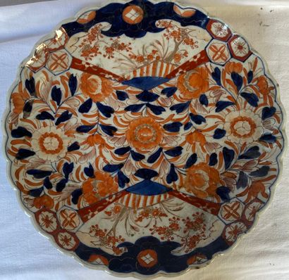 null Imari porcelain dish decorated in blue under iron red glaze and gold of flowers...