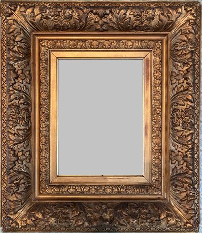 Two frames in stuccoed wood and gilded: -...