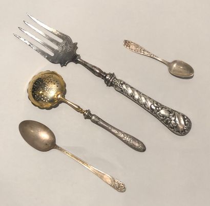null Filled silver handle serving utensils (800): a serving fork decorated with twisted...
