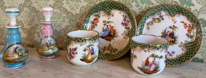 null Porcelain trinkets: pair of cups and their saucer decorated with gallant couples...