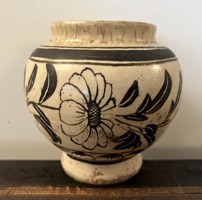 null Stoneware globular vase decorated with a frieze of flowers and foliage on a...