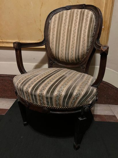 null Armchair in natural wood tinted mahogany molded and carved with pastilles and...