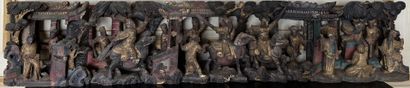 null Wooden frieze carved in high relief and painted polychrome and enhanced with...