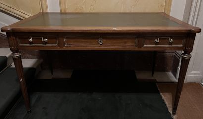 null Flat desk in mahogany with brass moldings. The belt with a large and two small...