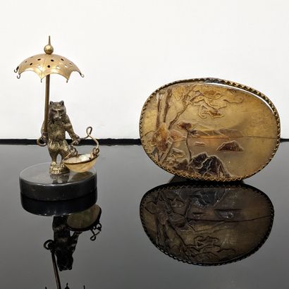 null Objects of window : Bear with a cradle and a parasol. Metal, brass and mother-of-pearl...