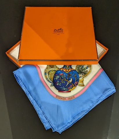 null HERMES scarf decorated with bottles, captioned "What does the bottle matter......
