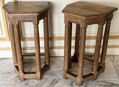 null Pair of molded natural wood stools, the seat with cut sides on six uprights...