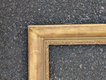 null Set of gilded or redecorated wood frames, the decoration: 1) with doucine and...