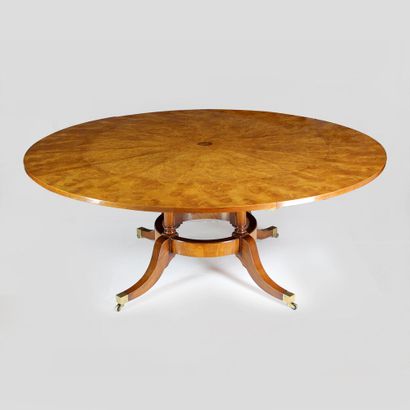 null Large mahogany dining room table, the circular extensible top in radiating burl...