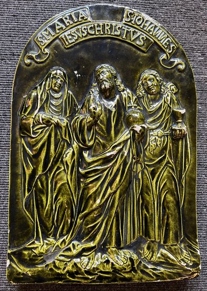 null Green glazed earthenware plate representing Christ surrounded by the Virgin...