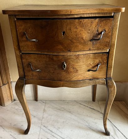 null Bedside table in burr fruit wood, the curved front with two drawers, the legs...
