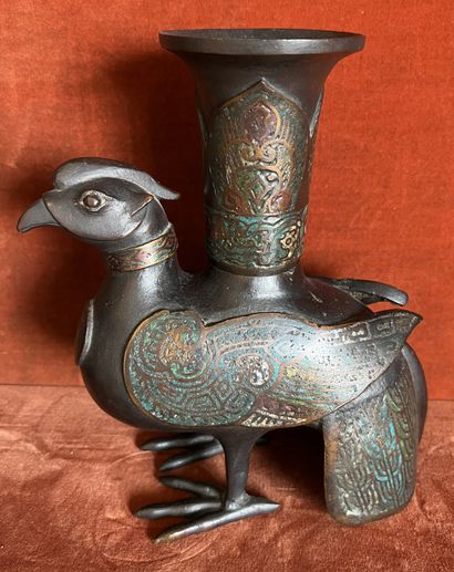 null Chopstick holder in bronze and cloisonné enamel, showing a bird carrying a vase....