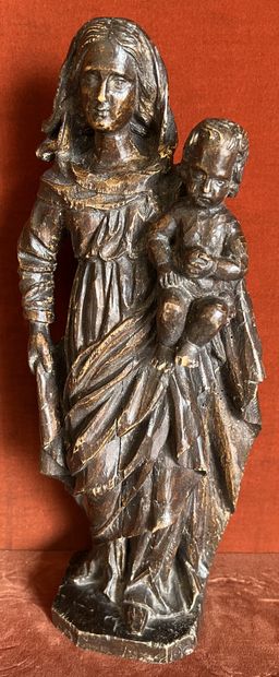 null Statue of Virgin and Child in carved and patinated wood. Engraved Tiquet on...