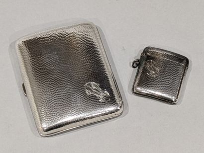 null Cigarette case and match case in hammered silver (925). Each one is engraved...