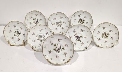 null Suite of eight porcelain saucers decorated with exotic birds on branches in...