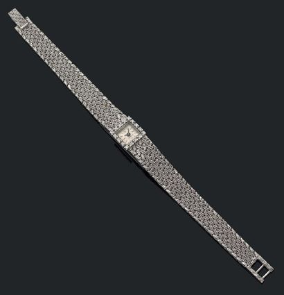 null Montre bracelet de dame mécanique en or gris 18K (750), le tour de la lunette...