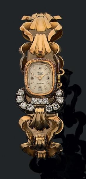 null Montre bracelet de dame mécanique en or jaune 18K (750) à boîtier oblong souligné...