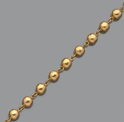 null Bracelet en or jaune 18K (750) articulé de billettes.
Long.: env. 18,5 cm.
Poids...