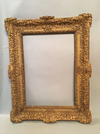 null Cadre en bois et stuc doré à décor Bérain.
Style Louis XIV.
61 x 43 x 13 cm