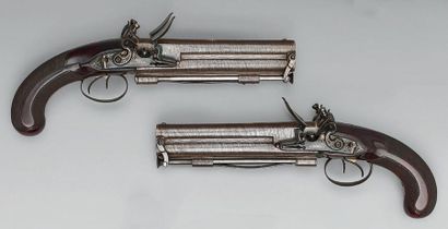 null Large pair of flintlock pistols, superimposed damask steel barrels with tobacco-coloured...