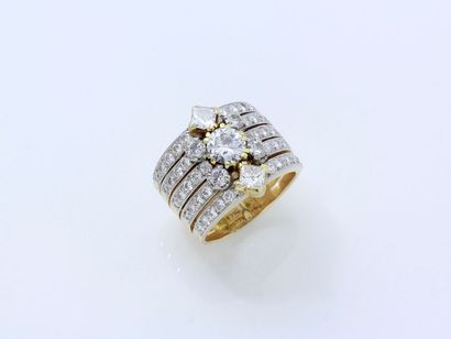 null Bague bandeau en or 750 millièmes composée de 5 anneaux ponctués de diamants...