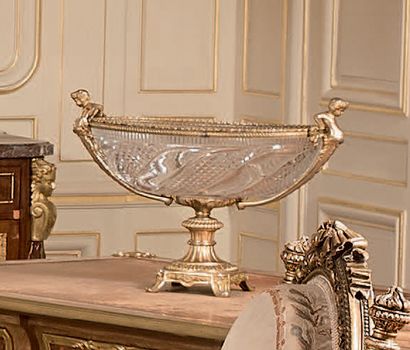 null Large bowl in cut moulded glass, with chased and gilded bronze frame, oblong...