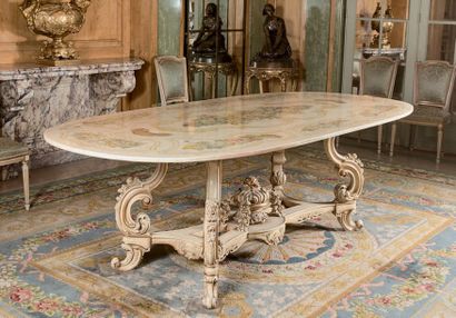 Dining room table with white marble top decorated...