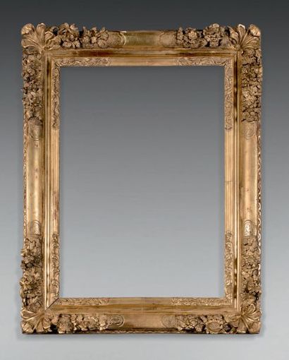 null Frame in molded, carved and gilded oak, corner with palmettes and flowers.
First...