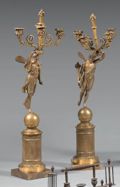 Pair of four-light candelabra in chased and...