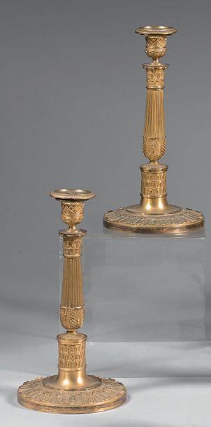 Pair of torches in chased and gilded bronze;...