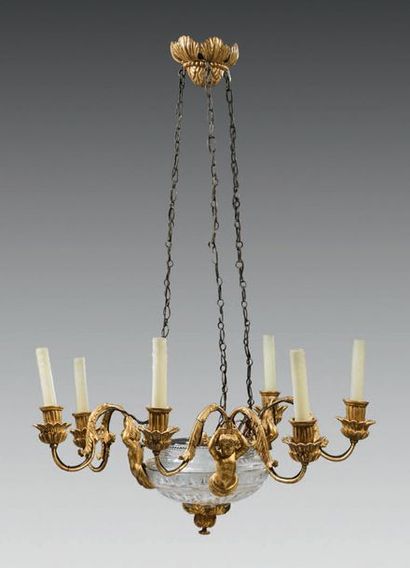 Chandelier with six lights in cut crystal and carved and gilded wood; the leafed...
