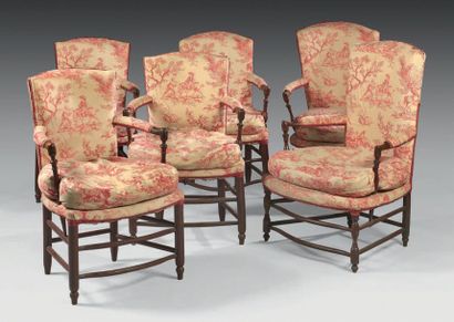 null Set of six chairs with slightly curved high back in turned oak; spindle armrest...