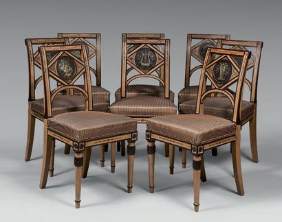  Set of eight chairs with slightly inverted backrests in beech moulded, sculpted...