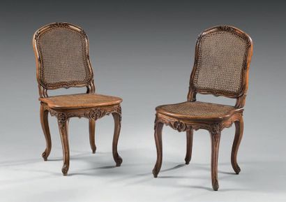 Pair of beech chairs moulded and carved with...