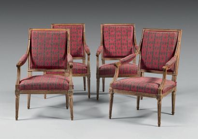 null Suite of four flat-backed armchairs "à la reine" in moulded beech; consoles...