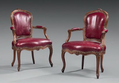 null Pair of armchairs with cabriolet backrest in molded and carved walnut with stylized...
