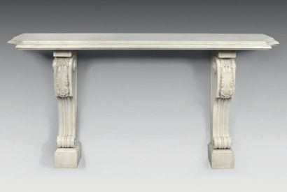 null Console in moulded and carved white marble; the rectangular top with recessed...