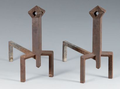 TRAVAIL FRANÇAIS Pair of wrought iron chenets with stylized animal heads.
Height...