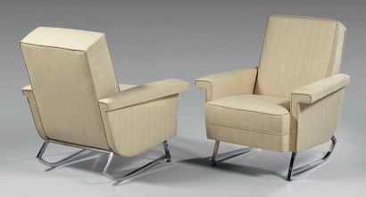 Travail français 1950 Pair of armchairs with inclined backrests, solid armrests with...