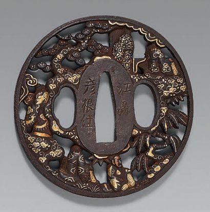 null Tsuba in openwork iron, enhanced with gold, silver and copper, representing...