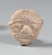 null Pearl in the shape of a Humbaba head.
Columella.
Middle East suspension gutter...
