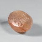 null Oval stamp inscribed on two lines in Aramaic with the name of its owner.
Pinkish-beige...