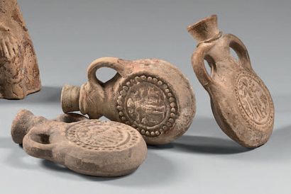 null Set of three pilgrimage flasks with two handles, stamped with Saint Menas. He...