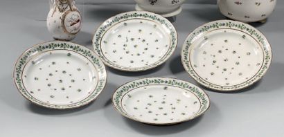 PARIS Four porcelain plates and a bottle cooler decorated with flowers called "au...