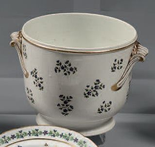 PARIS Four porcelain plates and a bottle cooler decorated with flowers called "au...