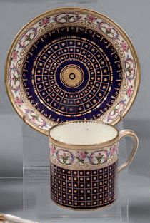 SÈVRES A litron mug and its soft porcelain saucer decorated with gold dots in blue...