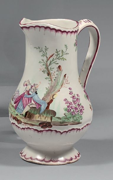 ROUEN, Manufacture Levavasseur A baluster-shaped jug on a earthenware pedestal, decorated...