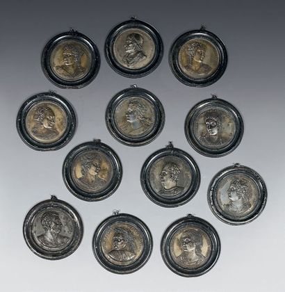 null A series of twelve circular lead medallions depicting the profiles of three...
